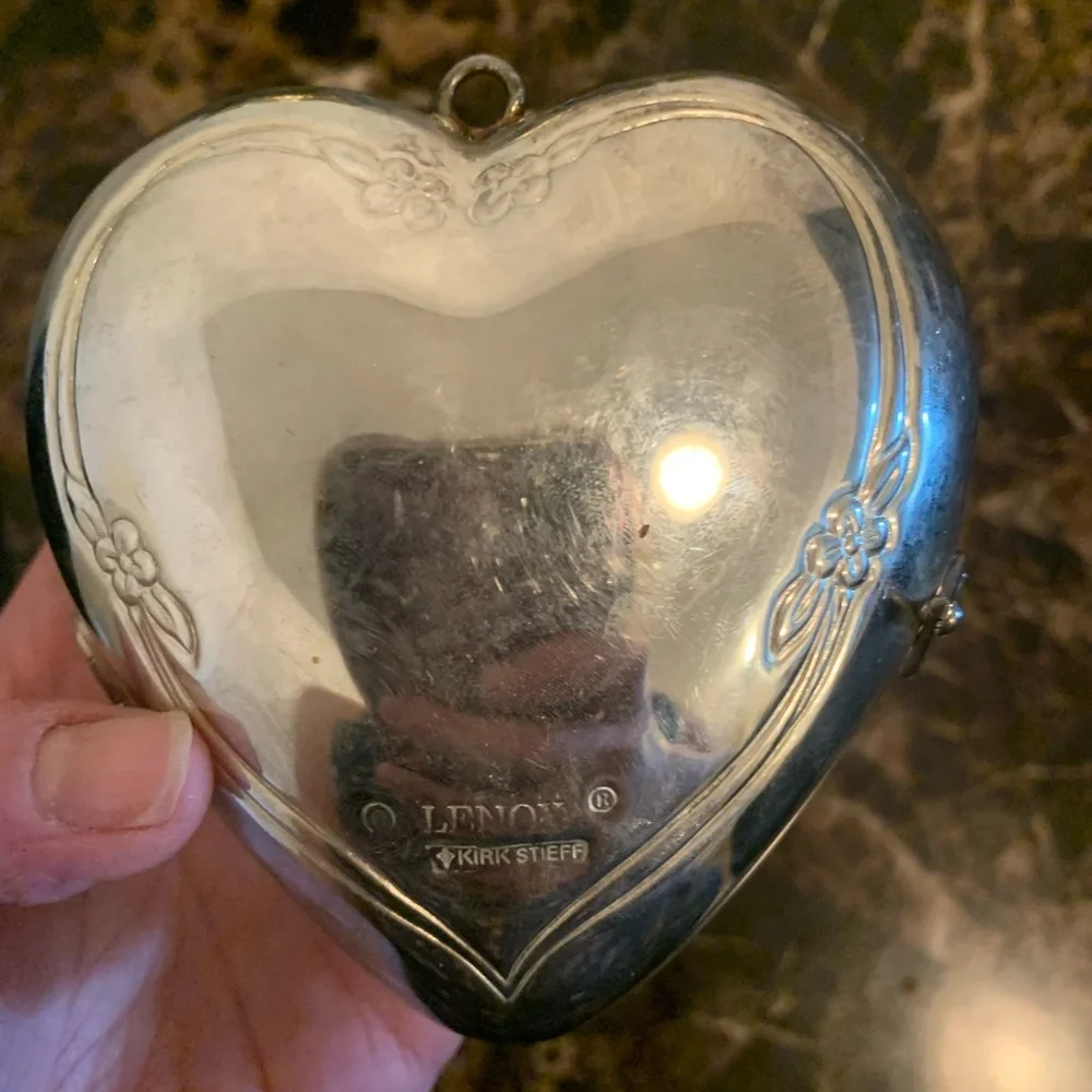 Silver plated hinged heart shaped trinket box with red lining